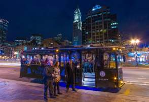 Patrons board the Ghosts and Gravestones tour bus in Boston.