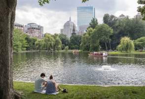 Two people picnicking on the Public Garden