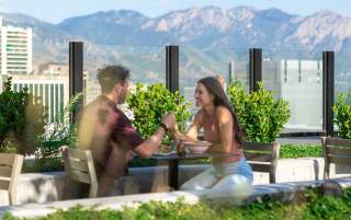 Couple eating at Mar Muntanya in SLC.