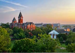drone shot of Samford Hall with campus in background