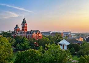 drone shot of Samford Hall with campus in background