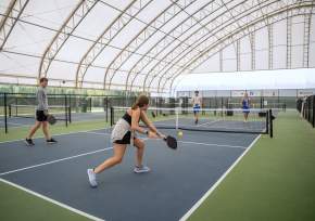 People playing pickleball