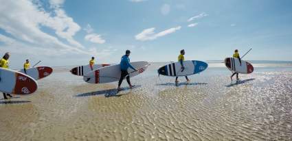 Surfers on West Wittering Beach
