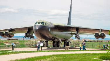 visitors walking around an airplane at the South Dakota Air & Space Museum outside of Rapid City,sd
