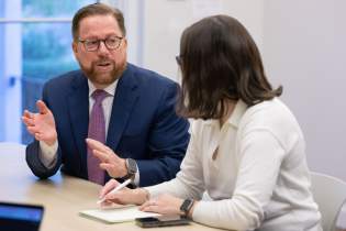 Paul Speaking at Rebrand