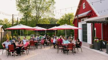 Patrons dine on the outdoor patio at Aubrey Vineyards