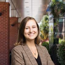 Rachel Elliott Headshot with CMCCC background