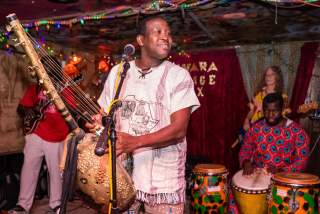 Ibrahim Aminou with band Zoumountchi performing at Sahara Lounge in Austin Texas