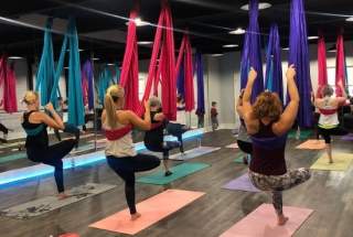 Women doing Aerial Yoga at Good Vibes Yoga Fitness & Wellness in Martinez