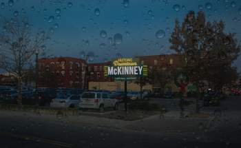 Rainy Day Downtown McKinney sign