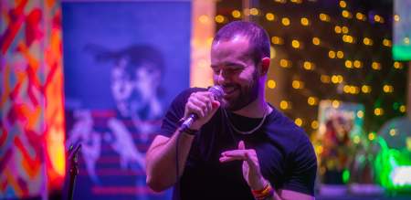 A man rapping into a mic