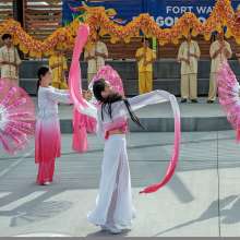 Dancers celebrate the Dragon Boat races at Promenade Park