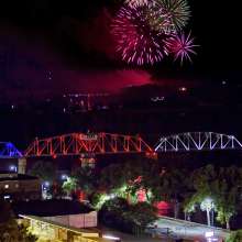 fireworks over a river