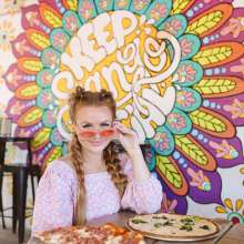 enjoying pizza at The Thirsty Goat