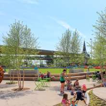 kids playing an a large urban park