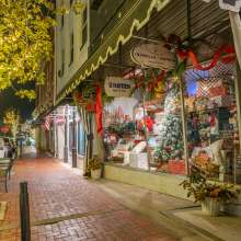 downtown shop storefront decorated for Christmas