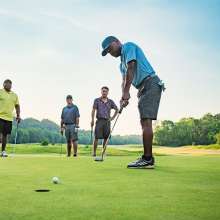 men golfing