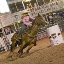 Woman rides horse for Nebraskaland