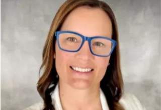 A formal headshot of Cassie Kosiba