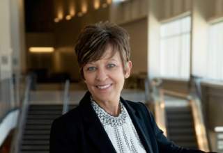 A formal portrait photo of Jayne Kraemer