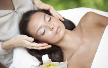 A woman at a spa having a massage