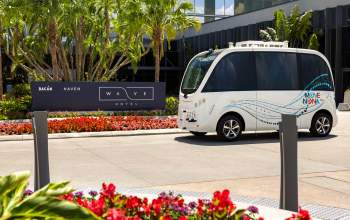 Lake Nona Wave Hotel beep shuttle outside hotel
