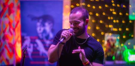 A man rapping into a mic