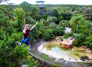 Visit Orlando employee at Gatorland zipline adventure