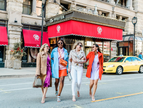 group of friends interlocking arms and walking in front of the Pfister Hotel