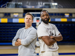 Wade & Diener on basketball court, back to back with arms crossed