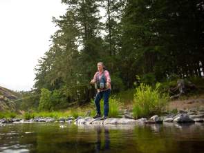 Fishing on the bank of the Umpqua River.