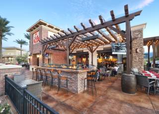 A large outdoor patio at a restaurant in Chandler, AZ