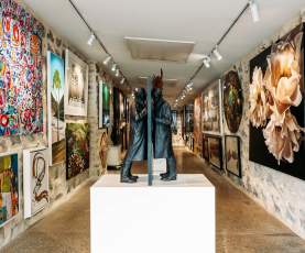 Interior shot with eclectic art at Art Bay Gallery