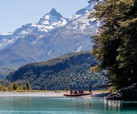 Group on Funyak tour with snow-capped mountains in the background