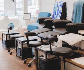 A row of massage chairs.
