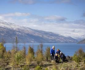 Group plating trees at at Jardine Park, Kelvin Heights,