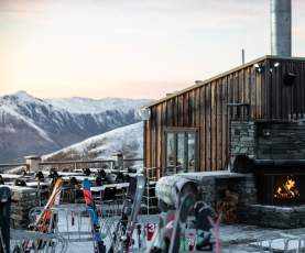 Treble Cone Base Building - a wooden cabin with fire and mountain views