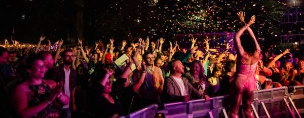 People watching performance at Manchester Pride's Gay Village Party