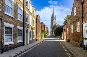 a street in Louth with a church at the end and houses either side