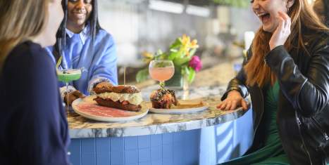 Group of Women enjoying food at Blume Restaurant in Greater Wilmington, Delaware