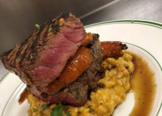 beautifully plated meat serving