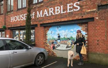 dilys outside house of marbles
