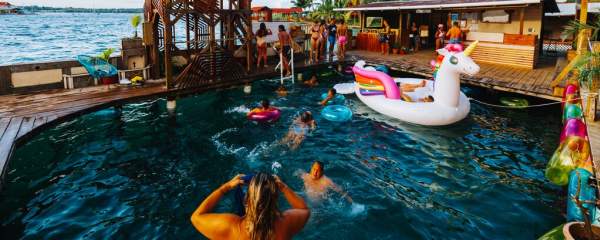 People enjoying at Aqua Lounge Hotel in Carenero Island, Bocas del Toro