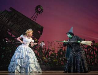 Celia Hottenstein as Glinda and Olivia Valli as Elphaba in the National Tour of WICKED