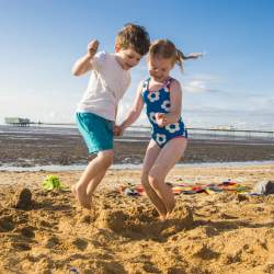Two kids on Southport beach