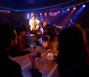 People listening to jazz at Blue Llama jazz club