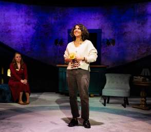 Two actresses on stage at Purple Rose Theatre