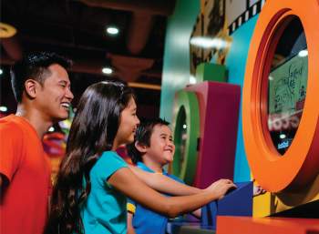 Family using Be A Star at Crayola Experience