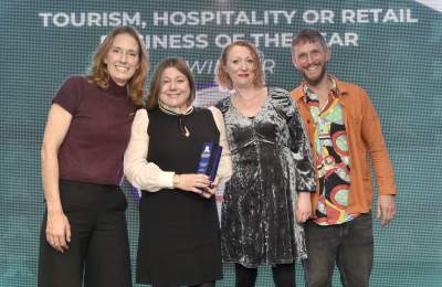 Danielle Dunfield presenting award to Ghost at the Feast | Chichester & District Business Awards 2025