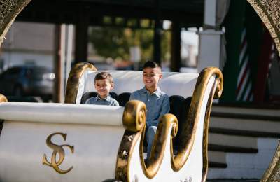 Christmas Capital of Texas kids in sleigh